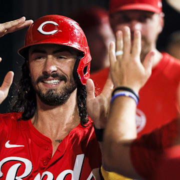 Sep 4, 2024; Cincinnati, Ohio, USA; Cincinnati Reds second baseman Jonathan India (6) high fives teammates after scoring on a RBI single hit by outfielder Spencer Steer (not pictured) in the fifth inning against the Houston Astros at Great American Ball Park. Mandatory Credit: Katie Stratman-Imagn Images