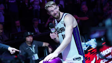 Apr 16, 2024; Sacramento, California, USA; Sacramento Kings forward Domantas Sabonis (10) lights the beam after the Kings defeated the Golden State Warriors during a play-in game of the 2024 NBA playoffs at the Golden 1 Center. Mandatory Credit: Cary Edmondson-Imagn Images