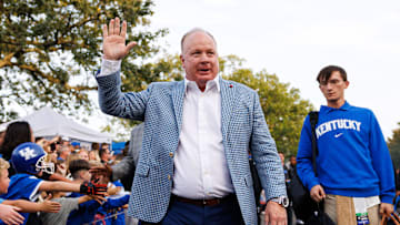Oct 12, 2024; Lexington, Kentucky, USA; Kentucky Wildcats head coach Mark Stoops greets fans at Cat Walk before the game against the Vanderbilt Commodores at Kroger Field. Mandatory Credit: Jordan Prather-Imagn Images
