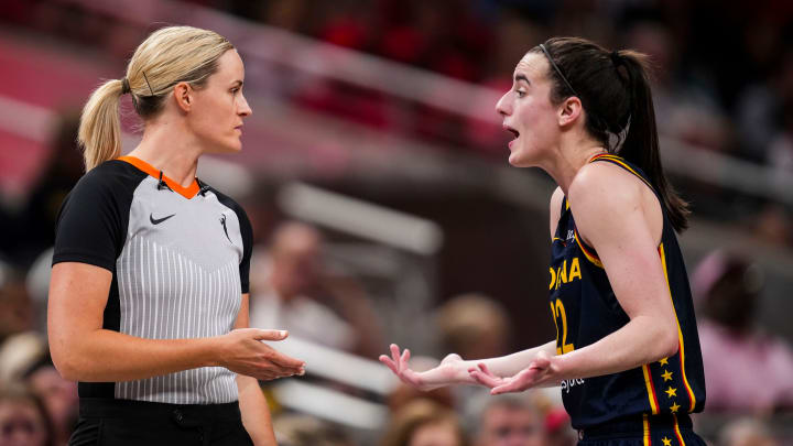 Indiana Fever guard Caitlin Clark (22) speaks with an official Wednesday, July 10, 2024, during the game at Gainbridge Fieldhouse in Indianapolis. The Mystics defeated the Fever, 89-84.