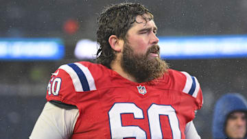 Dec 3, 2023; Foxborough, Massachusetts, USA; New England Patriots center David Andrews (60) walks off of the field after a game against the Los Angeles Chargers at Gillette Stadium. Mandatory Credit: Brian Fluharty-Imagn Images