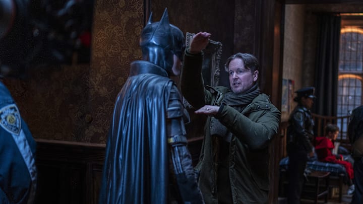 (L-r) ROBERT PATTINSON and director MATT REEVES and on the set in Warner Bros. Pictures’ action adventure “THE BATMAN,” a Warner Bros. Pictures release. Photo: Jonathan Olley/™ & © DC Comics. © 2021 Warner Bros. Entertainment Inc. All Rights Reserved.