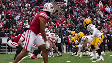 Nov 29, 2024; Madison, Wisconsin, USA;  The Wisconsin Badgers line up for a play during the second quarter against the Minnesota Golden Gophers at Camp Randall Stadium.