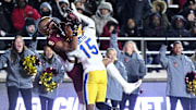 Nov 30, 2024; Chestnut Hill, Massachusetts, USA; Boston College Eagles wide receiver Reed Harris (4) makes a catch for a touchdown in front of Pittsburgh Panthers defensive back Rashad Battle (15) during the second half at Alumni Stadium. Mandatory Credit: Brian Fluharty-Imagn Images