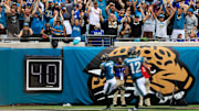 Jacksonville Jaguars fans erupt in the north end zone as wide receiver Brian Thomas Jr. (7) scores a touchdown during the second quarter of an NFL football matchup Sunday, Oct. 6, 2024 at EverBank Stadium in Jacksonville, Fla. The Jaguars edged the Colts on a field goal 37-34. [Corey Perrine/Florida Times-Union]