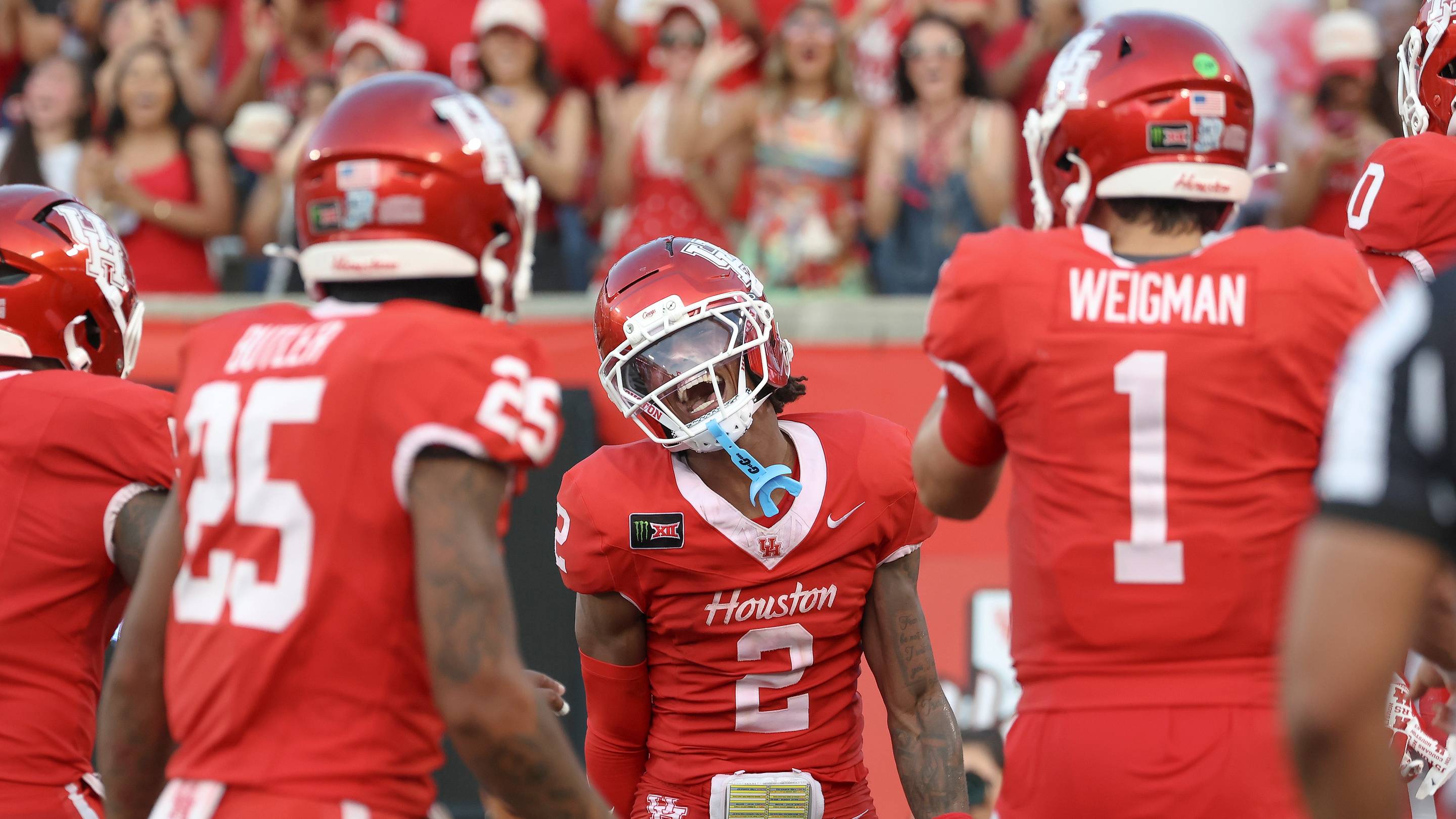 Sep 12, 2026; Houston, Texas, USA; Houston Cougars wide receiver Koby Young (2) celebrates after scoring a touchdown during the second quarter against the Southern University Jaguars at TDECU Stadium. Mandatory Credit: Troy Taormina-Imagn Images | IMAGN IMAGES via Reuters Connect