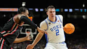 Duke Blue Devils forward Cooper Flagg controls the ball against Houston Cougars forward J'Wan Roberts.