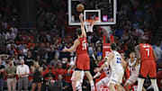 Nov 16, 2025; Houston, Texas, USA; Houston Rockets center Alperen Sengun (28) shoots and makes a basket during overtime against the Orlando Magic at Toyota Center. Mandatory Credit: Troy Taormina-Imagn Images