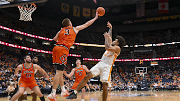 Dec 6, 2025; Nashville, Tennessee, USA;  Illinois Fighting Illini forward Ben Humrichous (3) blocks the shot of  Tennessee Volunteers guard Ja'Kobi Gillespie (0) during the first half at Bridgestone Arena. Mandatory Credit: Steve Roberts-Imagn Images