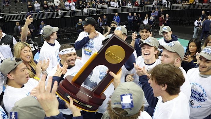 The Penn State Nittany Lions celebrate after winning the NCAA wrestling title at the T-Mobile Center in Kansas City.