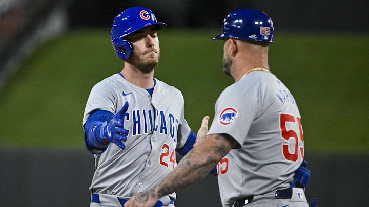 May 25, 2024; St. Louis, Missouri, USA; Chicago Cubs center fielder Cody Bellinger (24) is congratulated by first base coach Mike Napoli (55) after hitting a one run single against the St. Louis Cardinals during the ninth inning at Busch Stadium. May 25, 2024; St. Louis, Missouri, USA; Chicago Cubs center fielder Cody Bellinger (24) is congratulated by first base coach Mike Napoli (55) after hitting a one run single against the St. Louis Cardinals during the ninth inning at Busch Stadium.