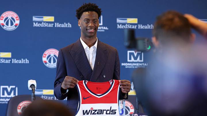 Jun 25, 2026; Washington, DC, USA; Washington Wizards first round draft pick and number one overall pick AJ Dybantsa poses for a photo with his jersey during a press conference at InterContinental Hotel. Mandatory Credit: Amber Searls-Imagn Images
