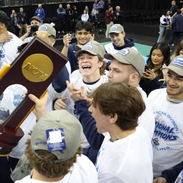 The Penn State Nittany Lions celebrate after winning the NCAA Wrestling Title at the T-Mobile Center in Kansas City. 
