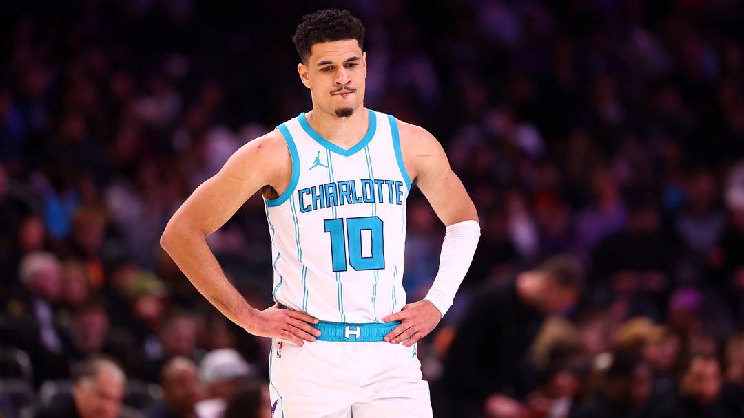 Jan 12, 2025; Phoenix, Arizona, USA; Charlotte Hornets guard Josh Green (10) against the Phoenix Suns at Footprint Center. Mandatory Credit: Mark J. Rebilas-Imagn Images