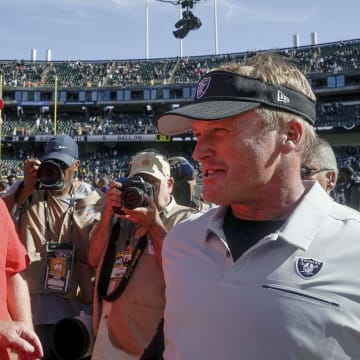 Sep 15, 2019; Oakland, CA, USA; Kansas City Chiefs head coach Andy Reid and Oakland Raiders head coach Jon Gruden meet after the game at the Oakland Coliseum. Mandatory Credit: Stan Szeto-USA TODAY Sports