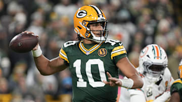 Nov 28, 2024; Green Bay, Wisconsin, USA;  Green Bay Packers quarterback Jordan Love (10) throws a pass during the first quarter against the Miami Dolphins at Lambeau Field. Mandatory Credit: Jeff Hanisch-Imagn Images