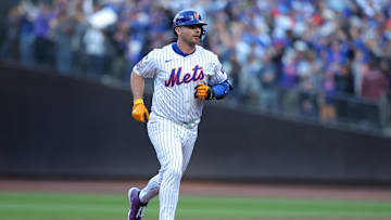 Oct 18, 2024; New York City, New York, USA; New York Mets first base Pete Alonso (20) runs the bases after hitting a three-run home run in the first inning against the Los Angeles Dodgers during game five of the NLCS for the 2024 MLB playoffs at Citi Field. Mandatory Credit: Brad Penner-Imagn Images