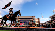 Spirit Rider Avery Langley rides Bullet after a score in the first half of the college football game between the Oklahoma State Cowboys and the Iowa State Cyclones at Boone Pickens Stadium in Stillwater, Okla., Saturday Nov. 29, 2025.