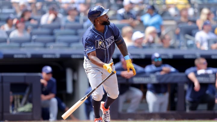 Tampa Bay Rays left fielder Randy Arozarena (56) watches his two run home run against the New York Yankees.