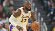 Dec 25, 2024; San Francisco, California, USA; Los Angeles Lakers forward LeBron James (23) dribbles against the Golden State Warriors during the first quarter at Chase Center. Mandatory Credit: Darren Yamashita-Imagn Images