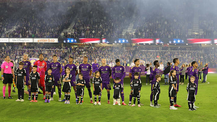 Nov 30, 2024; Orlando, Florida, USA; The starting eleven of Orlando City during the national anthem before the 2024 MLS Cup Eastern Conference Final match at Inter&Co Stadium. Mandatory Credit: Mike Watters-Imagn Images