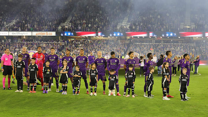 Nov 30, 2024; Orlando, Florida, USA; The starting eleven of Orlando City during the national anthem before the 2024 MLS Cup Eastern Conference Final match at Inter&Co Stadium. Mandatory Credit: Mike Watters-Imagn Images