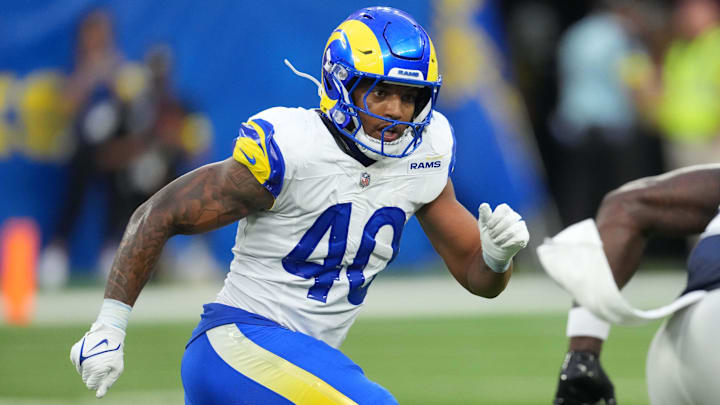 Aug 9, 2025; Inglewood, California, USA; Los Angeles Rams linebacker Tony Fields II (40) defends against Dallas Cowboys tight end Rivaldo Fairweather (45) in the first half at SoFi Stadium. Mandatory Credit: Kirby Lee-Imagn Images