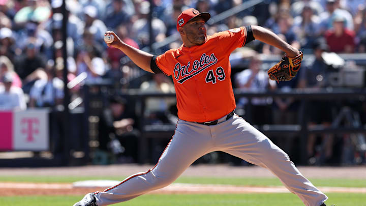 Mar 11, 2025; Tampa, Florida, USA; Baltimore Orioles pitcher Albert Suarez (49) throws a pitch against the New York Yankees in the first inning during spring training at George M. Steinbrenner Field. Mandatory Credit: Nathan Ray Seebeck-Imagn Images Mar 11, 2025; Tampa, Florida, USA; Baltimore Orioles pitcher Albert Suarez (49) throws a pitch against the New York Yankees in the first inning during spring training at George M. Steinbrenner Field. Mandatory Credit: Nathan Ray Seebeck-Imagn Images