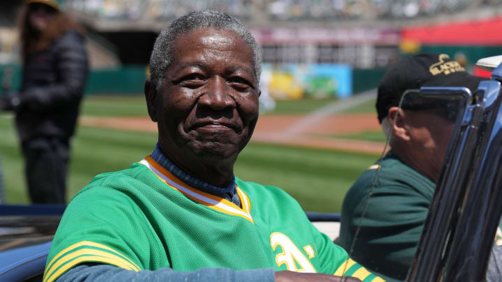 Apr 16, 2023; Oakland, California, USA; Oakland Athletics former pitcher Johnny Blue Moon Odom rides in a car on the field before the game against the New York Mets at RingCentral Coliseum. Mandatory Credit: Darren Yamashita-USA TODAY Sports