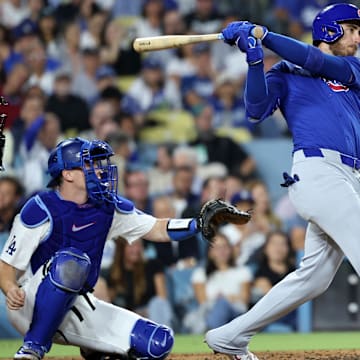 Sep 11, 2024; Los Angeles, California, USA;  Chicago Cubs right fielder Cody Bellinger (24) hits a 3-run home run during the fifth inning against the Los Angeles Dodgers at Dodger Stadium.