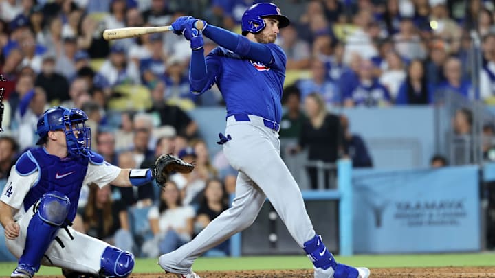 Sep 11, 2024; Los Angeles, California, USA;  Chicago Cubs right fielder Cody Bellinger (24) hits a 3-run home run during the fifth inning against the Los Angeles Dodgers at Dodger Stadium.