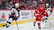 Detroit Red Wings left wing Raymond and Columbus Blue Jackets center Fantilli battle for the puck during the second period at Little Caesars Arena. 
