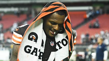 Deshaun Watson walks off the field after getting blown out by the Dallas Cowboys.