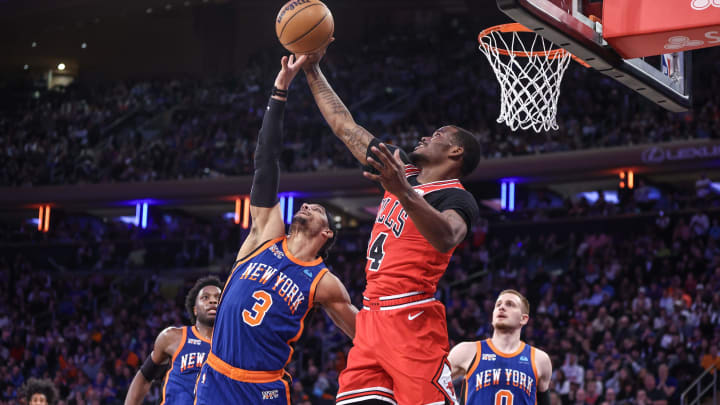 Apr 14, 2024; New York, New York, USA;  New York Knicks guard Josh Hart (3) and Chicago Bulls guard Javonte Green (24) fight for a loose ball in the fourth quarter at Madison Square Garden. 