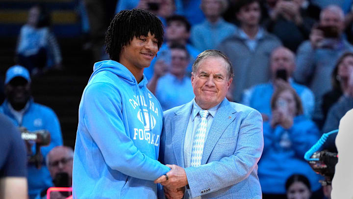 North Carolina Tar Heels head football coach Bill Belichick with recruit quarterback Bryce Baker