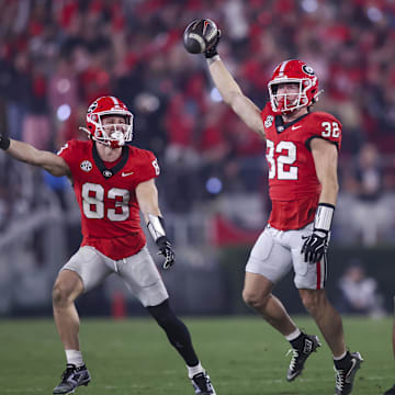 Nov 15, 2025; Athens, Georgia, USA; Georgia Bulldogs running back Cash Jones (32) and teammates celebrate during the second half against the Texas Longhorns at Sanford Stadium. Mandatory Credit: Brett Davis-Imagn Images