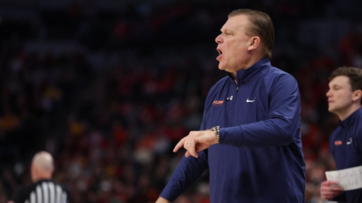 Mar 17, 2024; Minneapolis, MN, USA; Illinois Fighting Illini head coach Brad Underwood  coaches in the first half against the Wisconsin Badgers  at Target Center. Mandatory Credit: Matt Krohn-USA TODAY Sports