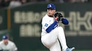 Los Angeles Dodgers starting pitcher Blake Snell (7) throws a pitch against the Hanshin Tigers during the first inning at Tokyo Dome. 