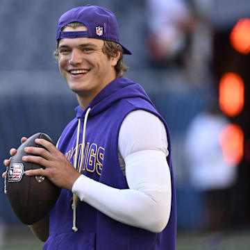 Sep 8, 2025; Chicago, Illinois, USA; Minnesota Vikings quarterback J.J. McCarthy (9) practices before the game at Soldier Field.