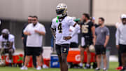Jun 10, 2025; New Orleans, LA, USA;  New Orleans Saints cornerback Kool-Aid McKinstry (4) looks on during minicamp at Ochsner Sports Performance Center. Mandatory Credit: Stephen Lew-Imagn Images