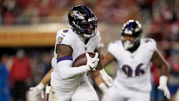 Dec 25, 2023; Santa Clara, California, USA; Baltimore Ravens linebacker Patrick Queen (6) runs with the ball after intercepting a pass against the San Francisco 49ers in the third quarter at Levi's Stadium. Mandatory Credit: Cary Edmondson-Imagn Images