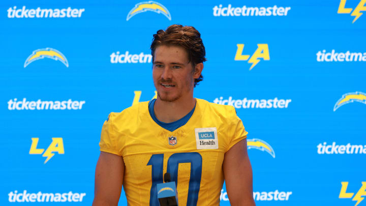 Jul 24, 2024; El Segundo, CA, USA;  Los Angeles Chargers quarterback Justin Herbert (10) speaks to the media after the first day of training camp at The Bolt. Mandatory Credit: Kiyoshi Mio-USA TODAY Sports