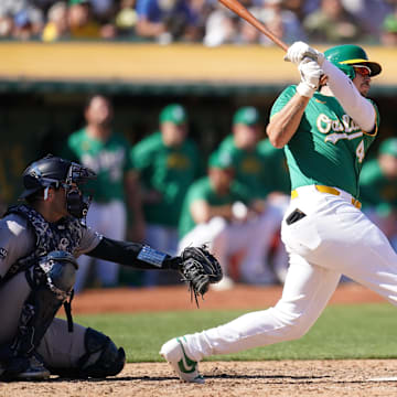 Sep 22, 2024; Oakland, California, USA; Oakland Athletics infielder Ryan Noda hits a two-run double against the New York Yankees in the sixth inning at the Oakland-Alameda County Coliseum. Mandatory Credit: Cary Edmondson-Imagn Images