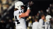 Nov 16, 2024; West Lafayette, Indiana, USA; Penn State Nittany Lions tight end Tyler Warren (44) catches a pass during warm ups before the game against the Purdue Boilermakers at Ross-Ade Stadium. Mandatory Credit: Marc Lebryk-Imagn Images