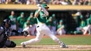 Sep 22, 2024; Oakland, California, USA; Oakland Athletics infielder Ryan Noda hits a two-run double against the New York Yankees in the sixth inning at the Oakland-Alameda County Coliseum. Mandatory Credit: Cary Edmondson-Imagn Images