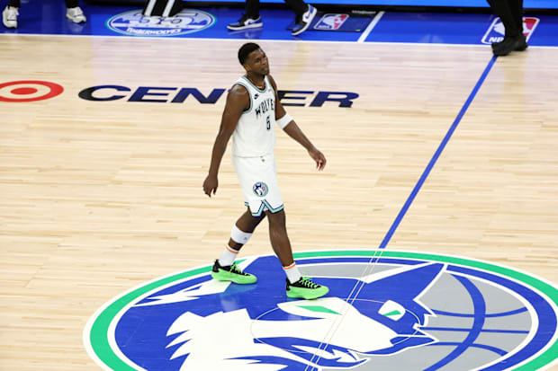 Minnesota Timberwolves guard Anthony Edwards walks down the court.