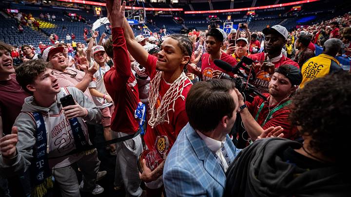 Arkansas guard Darius Acuff Jr. greets fans after defeating Vanderbilt in the SEC tournament championship game at Bridgestone Arena in Nashville, Tenn., Sunday, March 15, 2026.