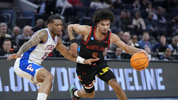Mar 27, 2025; San Francisco, CA, USA; Maryland Terrapins guard Ja'Kobi Gillespie (0) drives to the hoop past Florida Gators guard Alijah Martin (15) during the first half during a West Regional semifinal of the 2025 NCAA tournament at Chase Center. Mandatory Credit: Kyle Terada-Imagn Images