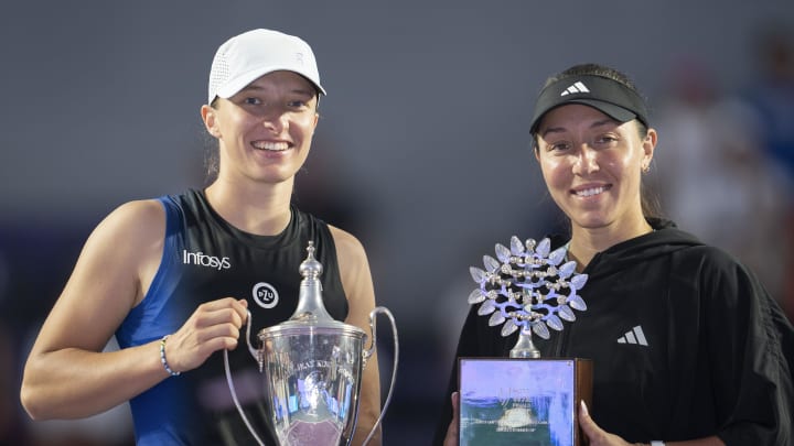 Nov 6, 2023; Cancun, Mexico; Iga Swiatek (POL) and Jessica Pegula (USA) pose with their trophies at the trophy presentation on day nine of the GNP Saguaros WTA Finals Cancun. Mandatory Credit: Susan Mullane-USA TODAY Sports