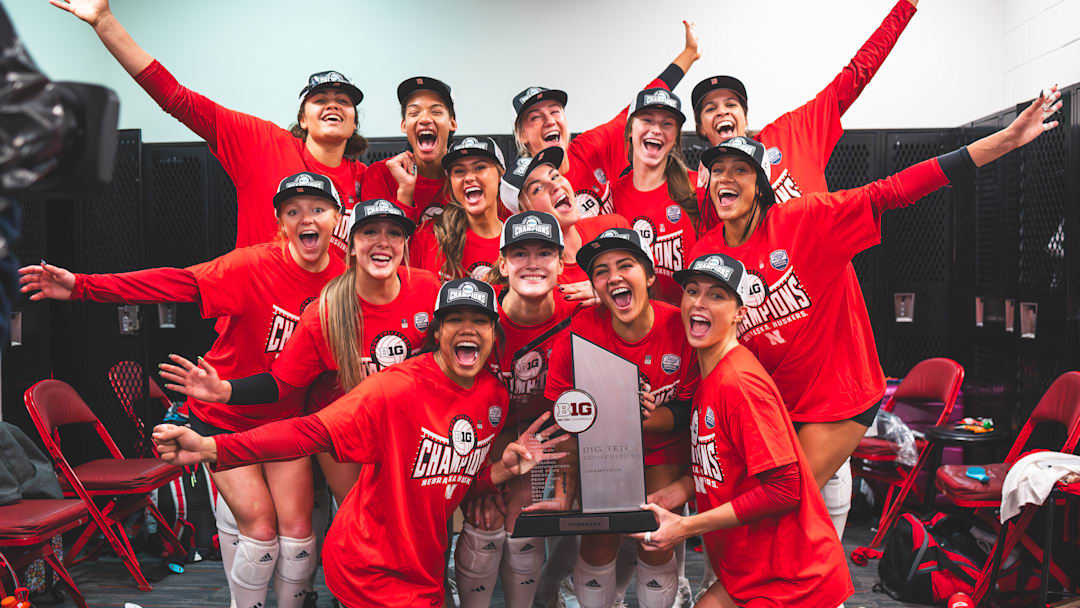 Nebraska volleyball players celebrate a share of the Big Ten title. Nebraska volleyball players celebrate a share of the Big Ten title.